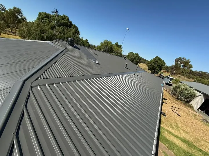 New guttering along a metal roof edge in Dubbo
