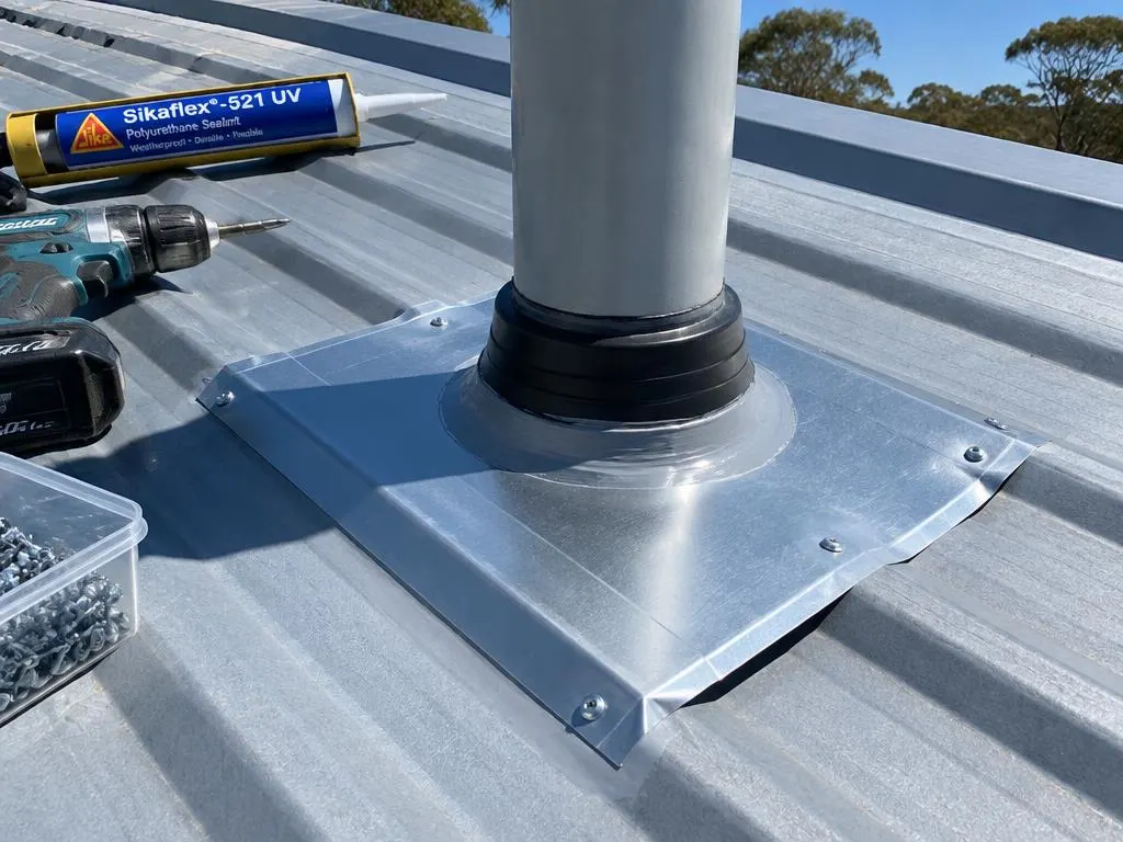 Roof repair with new flashing sealed around a roof penetration in Dubbo